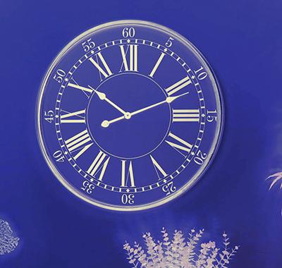 A clock in purple background